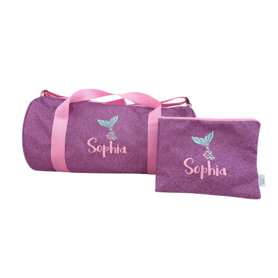 MALETA Y ESTUCHE MORADA BRILLOS ASA ROSA