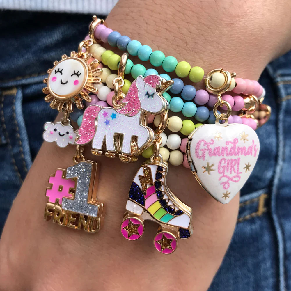 CHARM DE UNICORNIO CON BRILLO ROSA