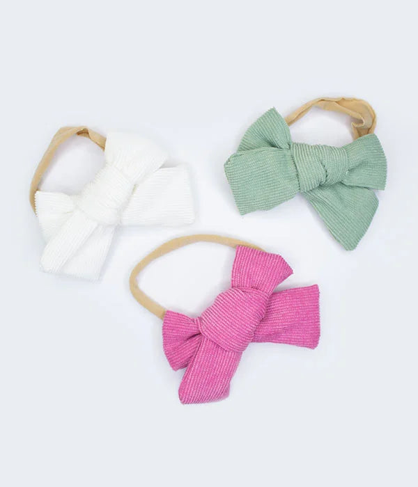 TRÍO DIADEMAS ELÁSTICAS CON MOÑO DE PANA