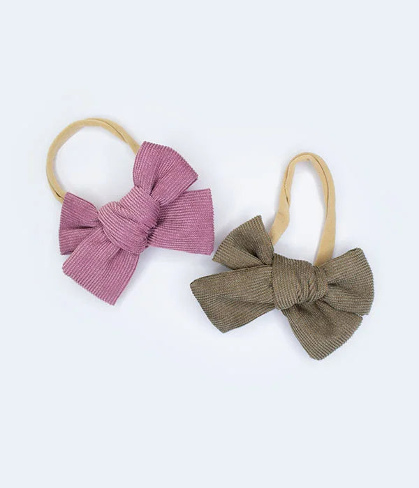 DUO DIADEMAS ELÁSTICOS CON MOÑO DE PANA