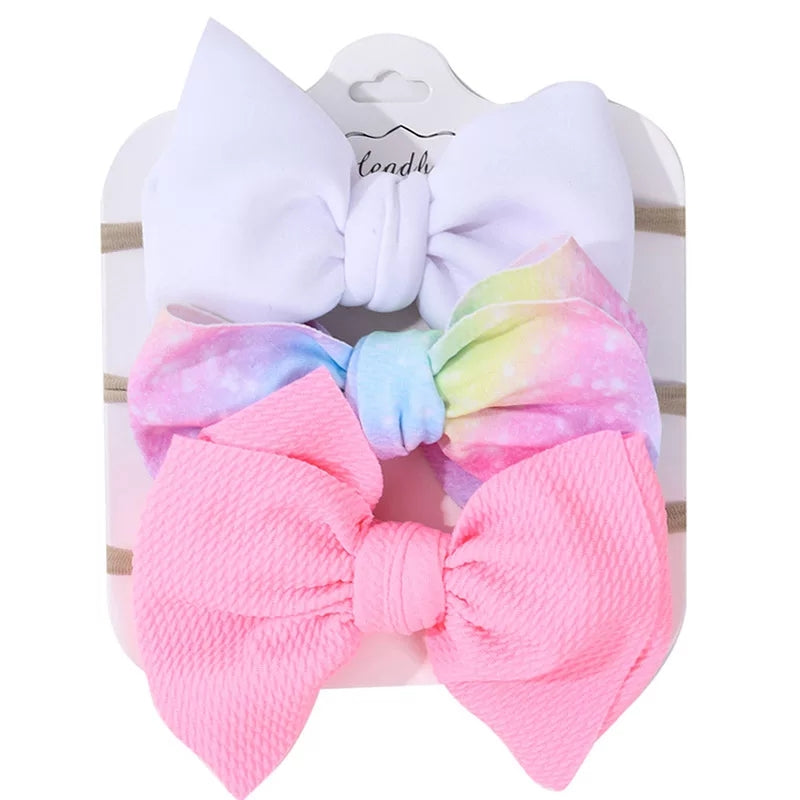 SET DE 3 DIADEMAS ELASTICAS CON MOÑO